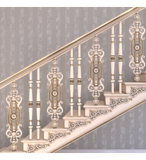 Traditional wood staircase baluster with carved rosettes