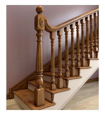 Farmhouse staircase post with grapevines from oak