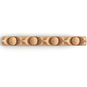 Narrow wooden moulding with carved pearls