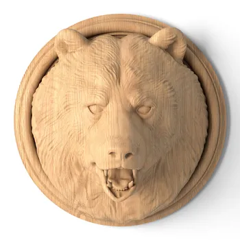 Carved bear head wood trim from oak Carved bear head wood trim from oak