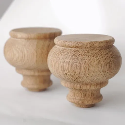 Rounded tapered bun feet for furniture cabinet. sofas