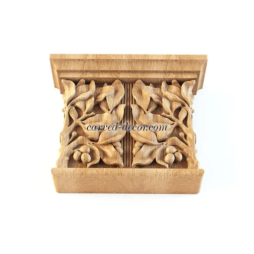 Pilaster caps decorative with bay leaves and berries from beech