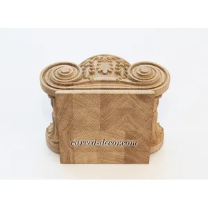 Beech column tops Ionic order with floral elements