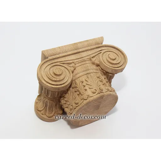 Wood column tops Ionic order with floral elements