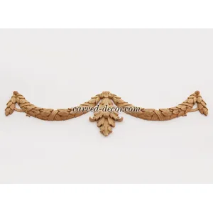 Decorative wood laurel swag onlay with ribbons