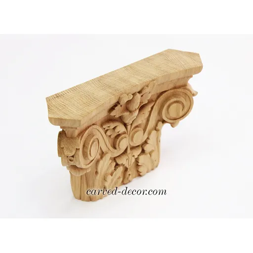 Oak pilaster caps with wood carved leaves. scrolls and flowers