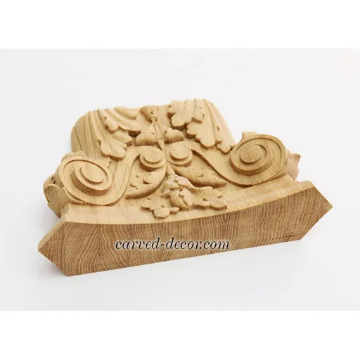 Oak ornamental pilaster caps with wood carved leaves. scrolls and flowers