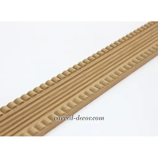 Handcrafted wide fluted moulding with reeded trim