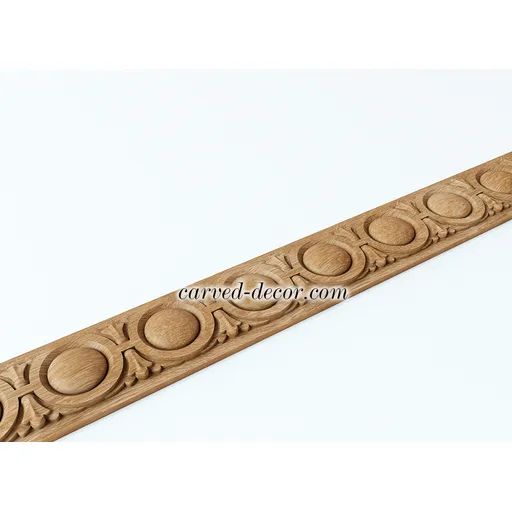 Ornate moulding with rosettes from hardwood