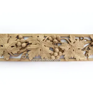 Carved decorative oak trim with grape wines