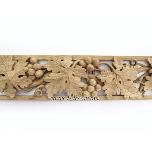 Carved decorative oak trim with grape wines